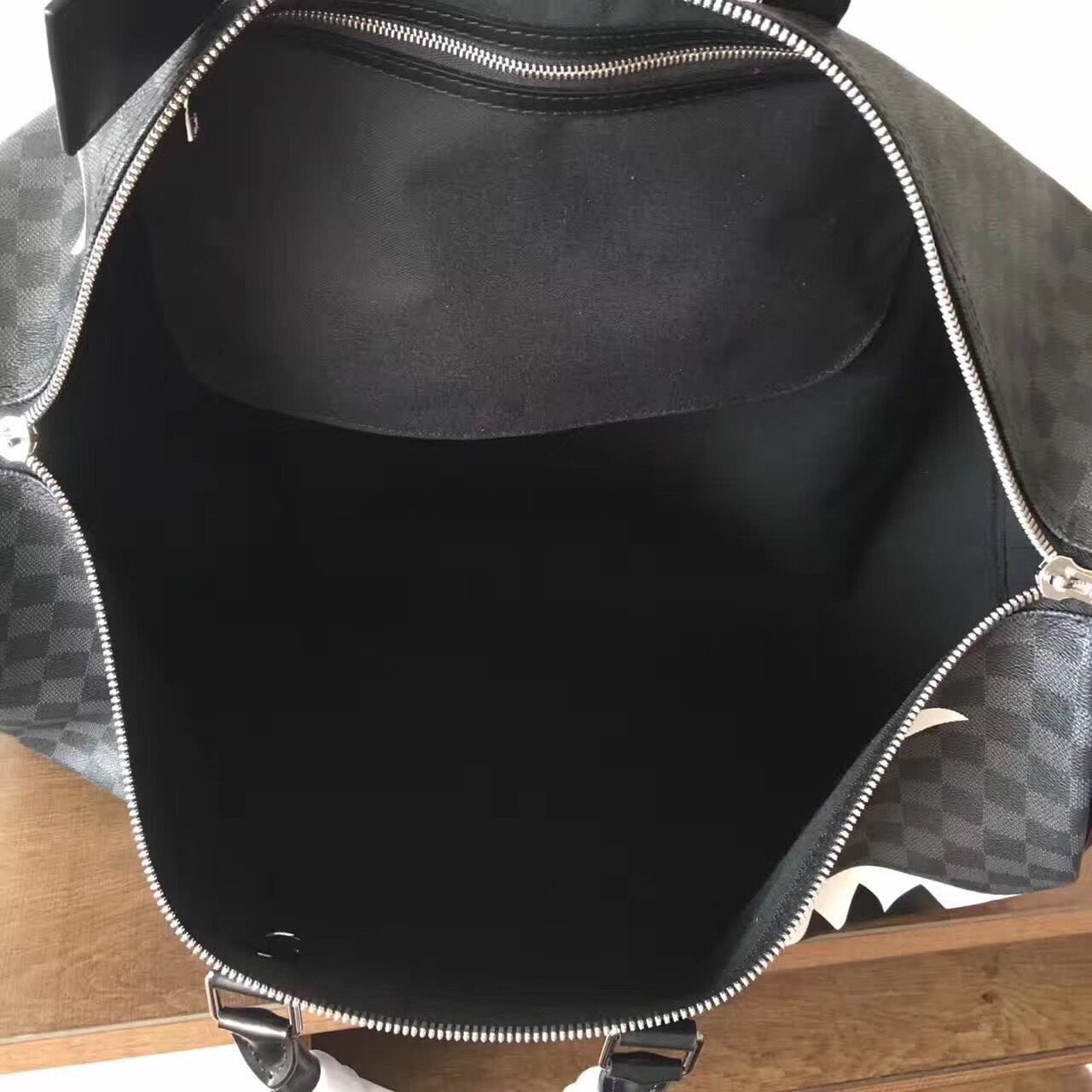 LV Shark Luggage bag