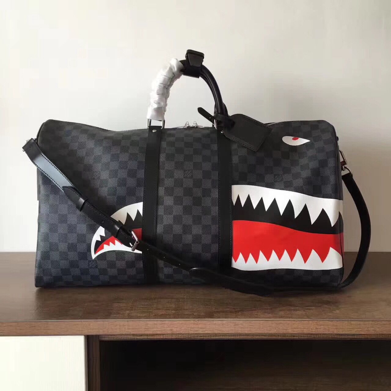 LV Shark Luggage bag