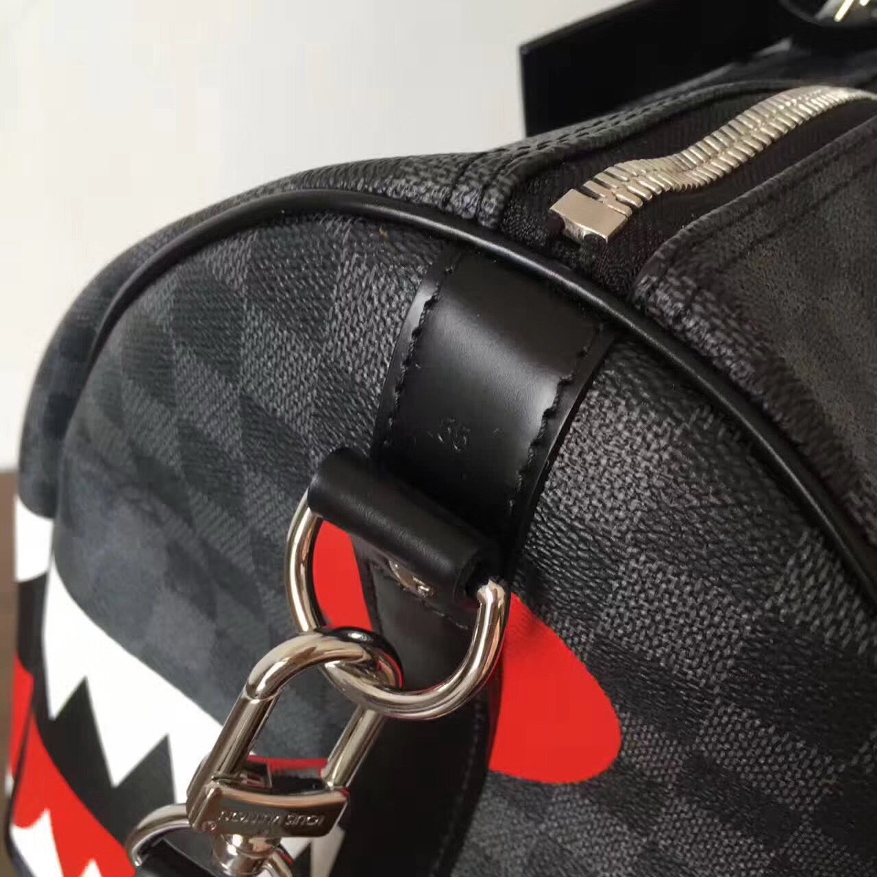 LV Shark Luggage bag