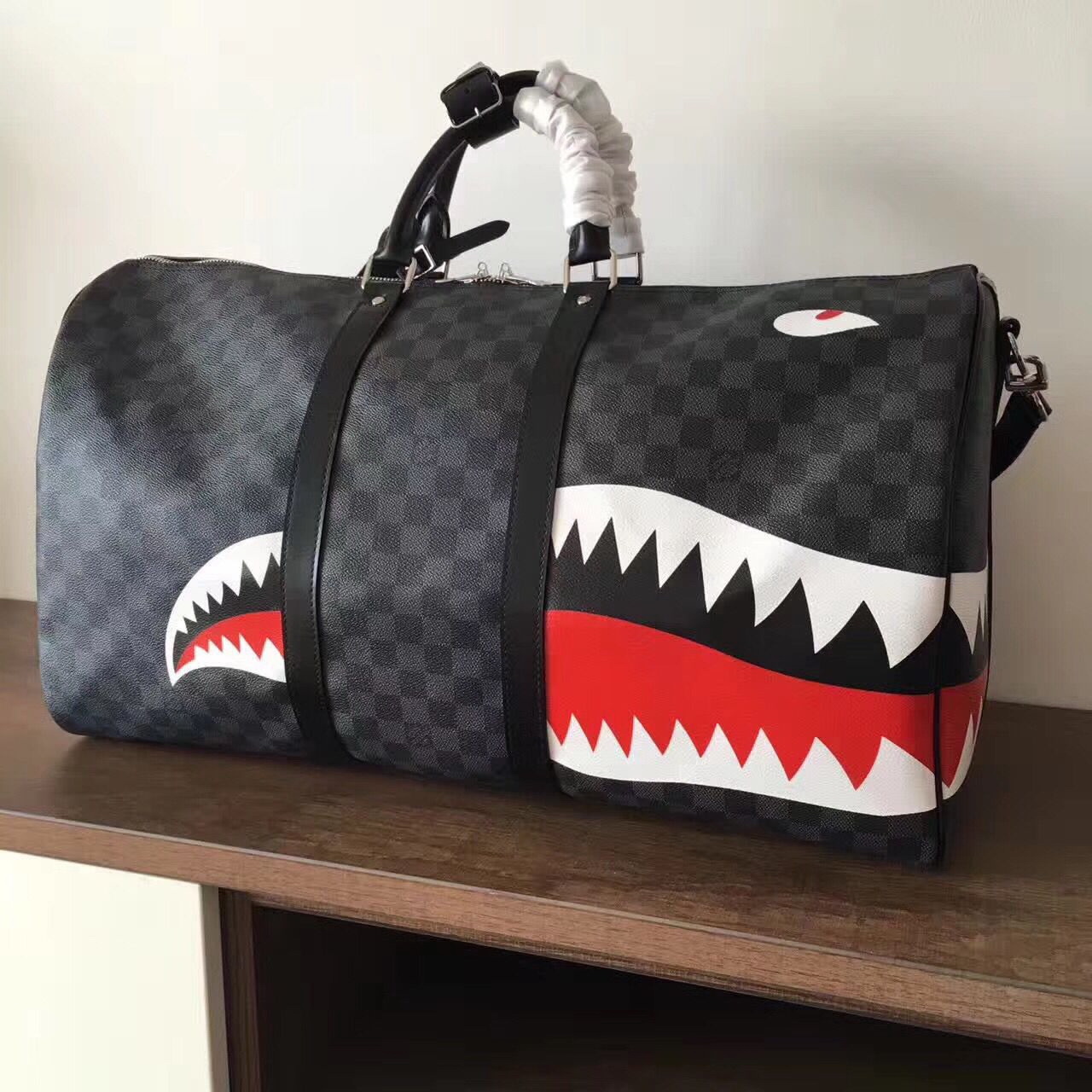 LV Shark Luggage bag